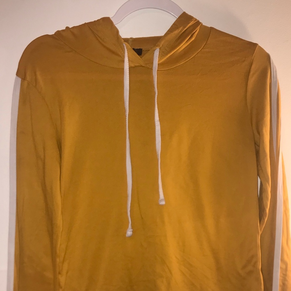 A long sleeve shirt with a hoodie